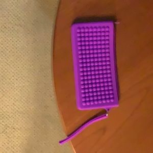 RUMBA rubber purple wristlet